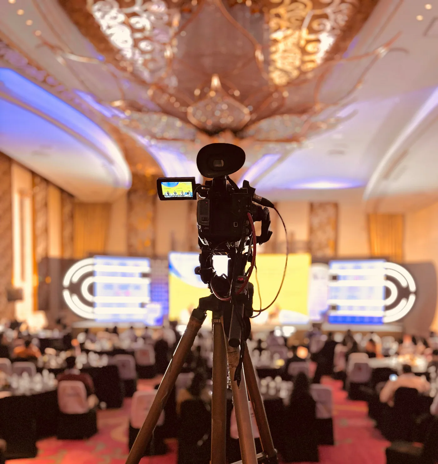 Camera recording a live expert webinar